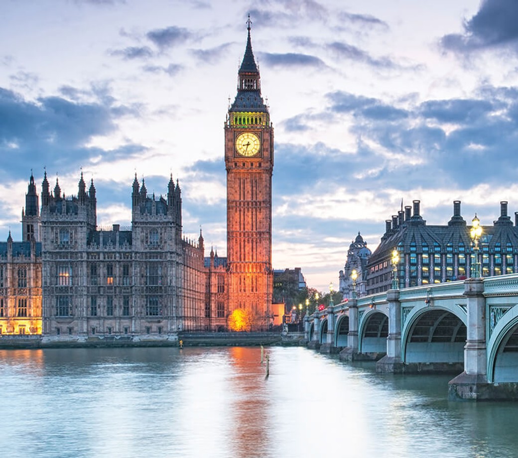 Big Ben at dusk across the river Thames